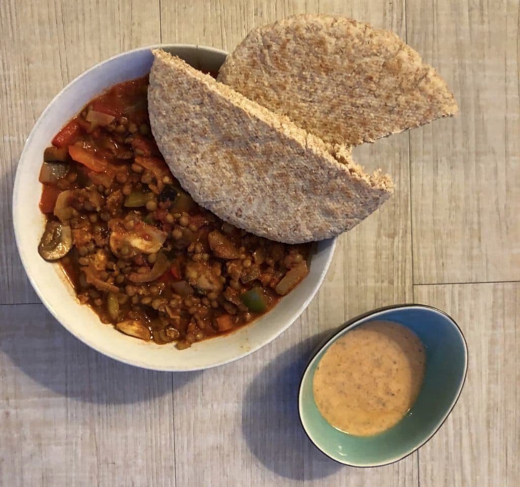 Vegetarische linzenstoof met courgette en paprika